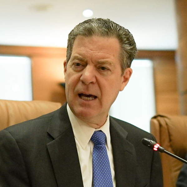 H. E. Mr. Sam Brownback